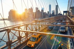 Brooklyn Bridge with traffic at sunset - Songquan Photography